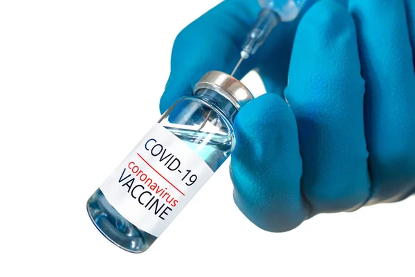 Coronavirus aşısı COVID-19 'un geliştirilmesi ve yaratılması. Coronavirus aşısı kavramı doktor mavi aşı kavanozunun elinde. Aşı Coronavirus 'a karşı savaş kavramı.