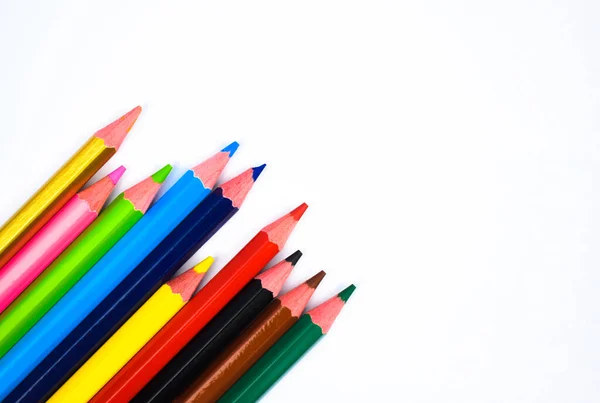 Some Different Colored Wood Pencil Crayons Scattered White Paper Background — Stock Photo, Image