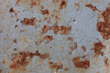 Paslı ve eski boyalı bir duvar. Soyut sunumlar veya kentsel biçim için arkaplan.