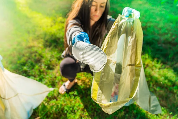 Coronavirus Woman Picking Blue Rubber Gloves Face Masks Green Grass — Stock Photo, Image