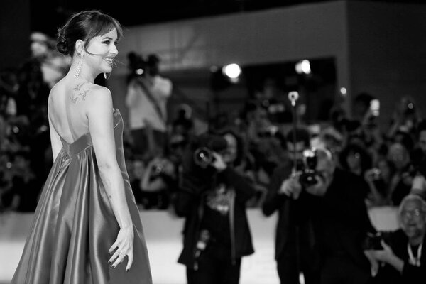 VENICE, ITALY - SEPTEMBER 01: Dakota Johnson walks the red carpet of the movie 'Suspiria' during the 75th Venice Film Festival on September 1, 2018 in Venice, Italy. 