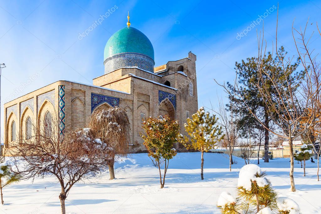 Snow and park around ornated mosque of Hazrati Imam complex, rel