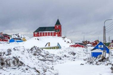 Bethel Church and Inuit village full of snow, Sisimiut (Holstein