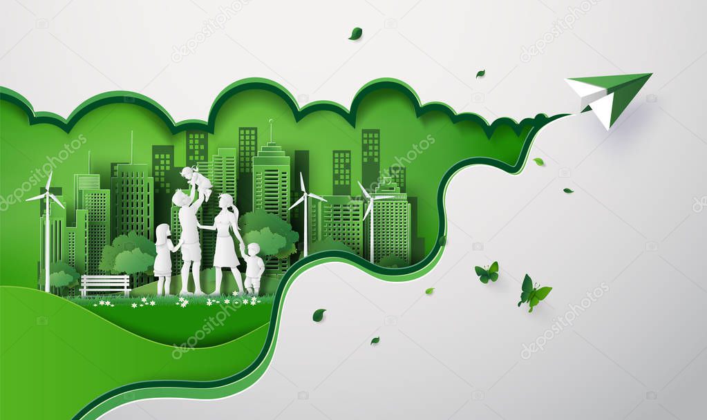 Paper cut of eco with happy family on the field .
