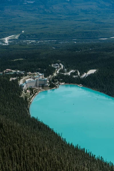 Breathtaking view of the turquoise lake, world famous Fairmont Hotel and mountain scenery from the summit of The Big Beehive hiking trail above Lake Louise, Banff National Park, Alberta, Canada