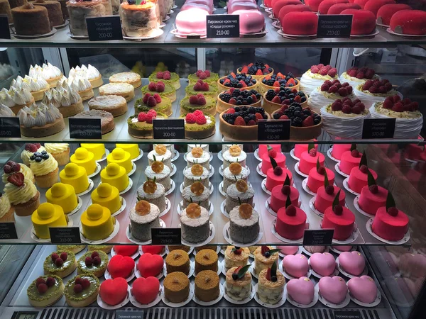 Colorful sweet cakes in the shop window — Stock Photo, Image