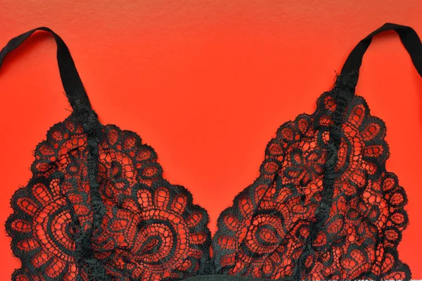 Black Lace Bra Lies Red Background — Stock Photo, Image