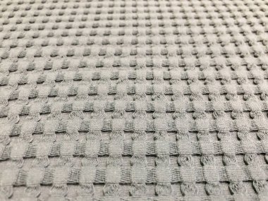 Gri kumaş dikişsiz desen - sürekli kopyalanan doku arkaplanı.