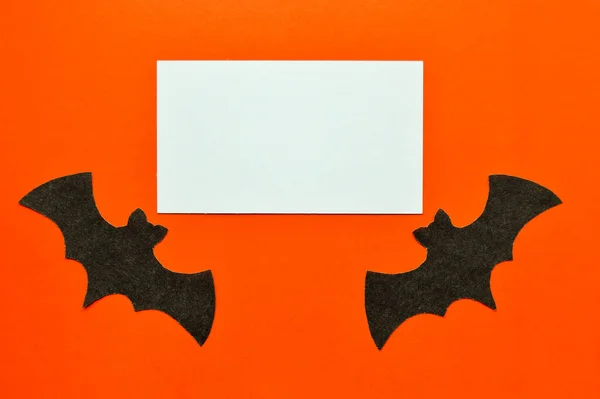 Morcegos Papel Preto Jazem Fundo Laranja Com Mockup Branco — Fotografia de Stock
