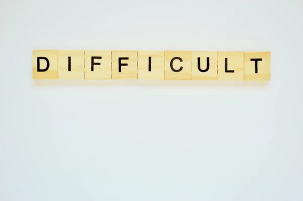 Word Difficult Wooden Blocks Lettering Top White Background Top View — Stock Photo, Image