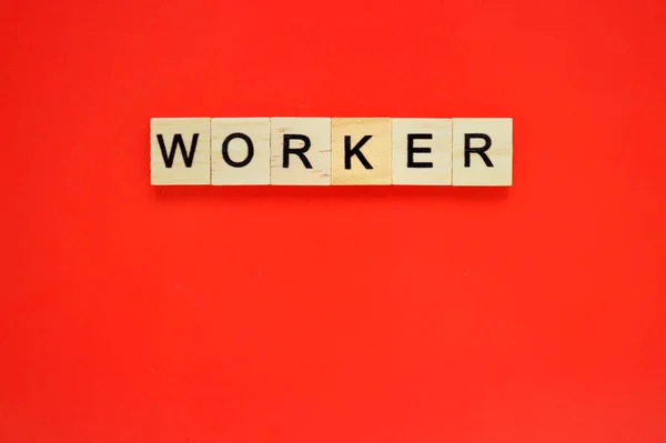 Word Worker Wooden Blocks Lettering Top Red Background Top View — Stock Photo, Image