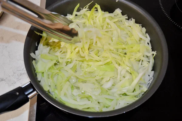 Stewed Cabbage Skillet Stirred Metal Tongs — Stock Photo, Image