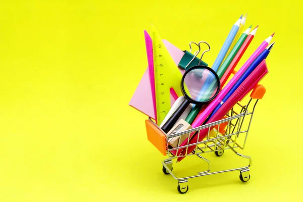 Shopping Basket Colorful School Stationery Yellow Background Concept School Education — Stock Photo, Image