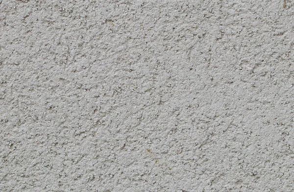 Açık bej beton duvar (arkaplan, doku), yakın çekim üst görünüm.