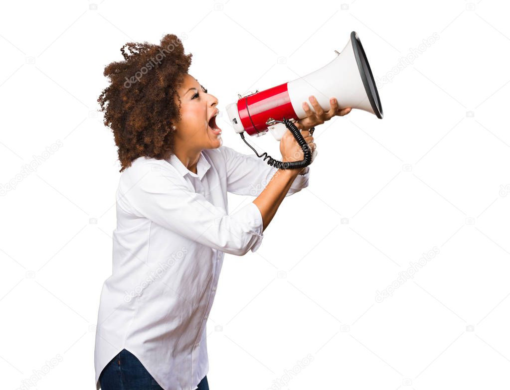 young black woman shouting on the megaphone