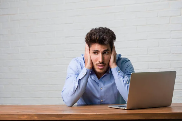 Young Business Man Sitting Working Laptop Covering Ears Hands Angry — Stock Photo, Image