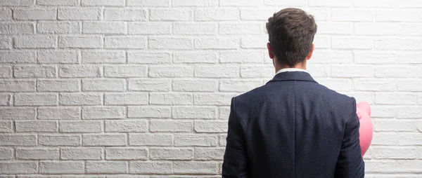 Young Business Man Wearing Suit White Bricks Wall Showing Back — Stock Photo, Image