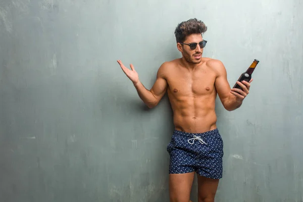 Young Athletic Man Wearing Swimsuit Grunge Wall Crazy Desperate Screaming — Stock Photo, Image