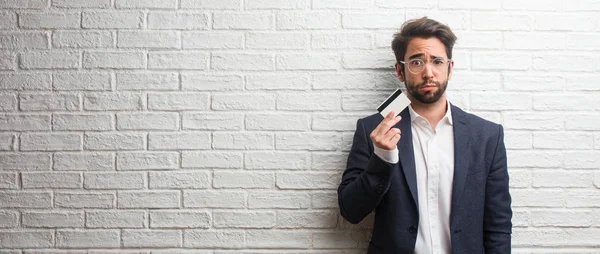 Young Business Man Wearing Suit White Bricks Wall Worried Overwhelmed — Stock Photo, Image