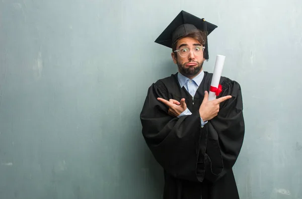 Young Graduated Man Grunge Wall Copy Space Confused Doubtful Decide — Stock Photo, Image