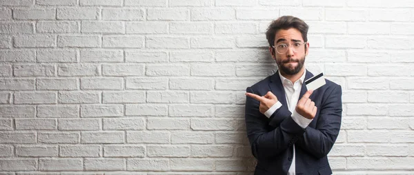 Young Business Man Wearing Suit White Bricks Wall Confused Doubtful — Stock Photo, Image