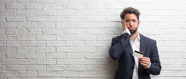 Young Business Man Wearing Suit White Bricks Wall Worried Overwhelmed — Stock Photo, Image