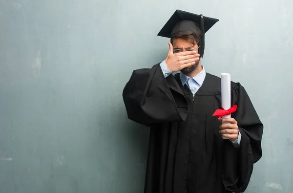 Young Graduated Man Grunge Wall Copy Space Looking Gap Hiding — Stock Photo, Image