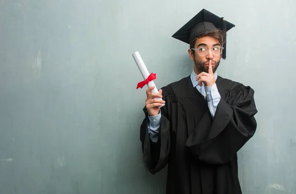 Young Graduated Man Grunge Wall Copy Space Keeping Secret Asking — Stock Photo, Image