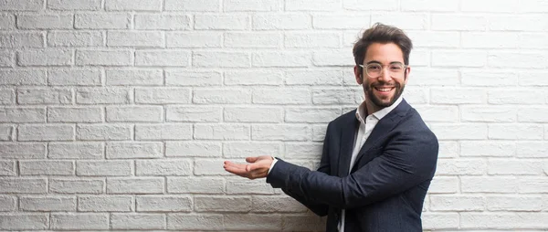 Young Friendly Business Man Holding Something Hands Showing Product Smiling — Stock Photo, Image