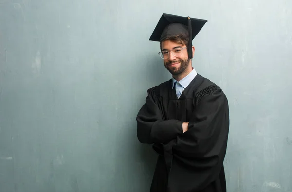 Young Graduated Man Grunge Wall Copy Space Crossing His Arms — Stock Photo, Image