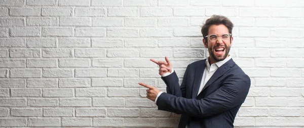 Young Friendly Business Man Pointing Side Smiling Surprised Presenting Something — Stock Photo, Image