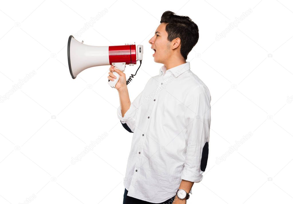 teenager shouting on a megaphone