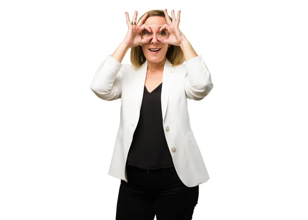 Blonde Mature Woman Doing Glasses Gesture — Stock Photo, Image