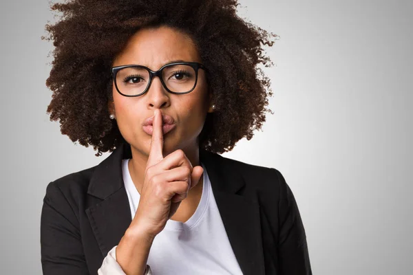 Black Business Woman Doing Silence Gesture Gray Background — Stock Photo, Image