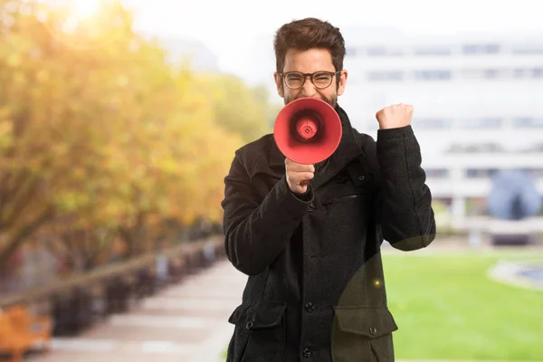 Jonge Man Met Een Megafoon — Stockfoto