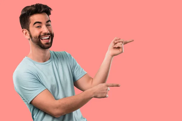 Young Man Smiling Pointing — Stock Photo, Image