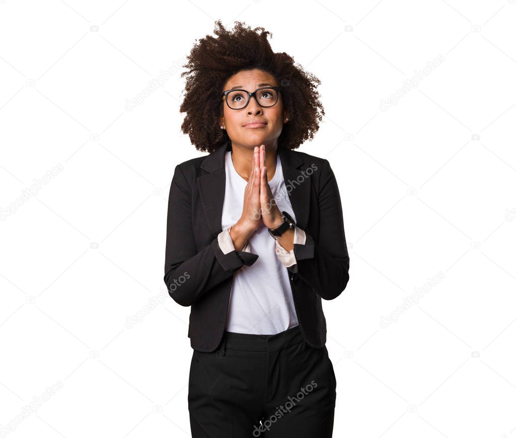business black woman praying isolated on white background