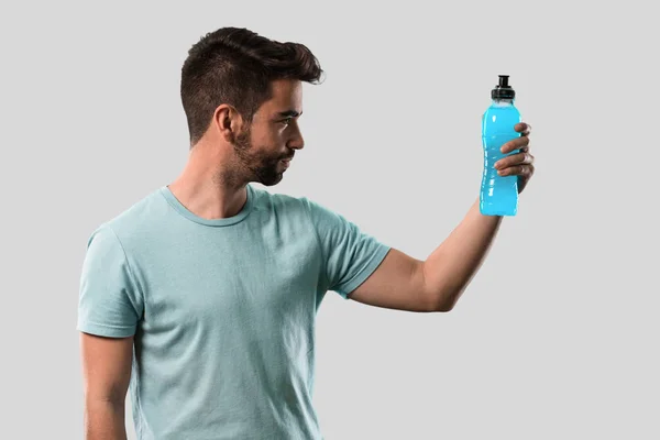 Athletic Young Man Holding Bottle — Stock Photo, Image
