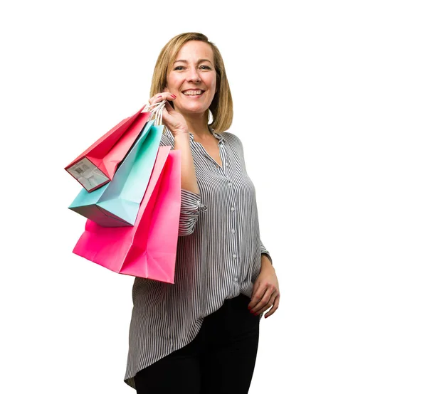 Blonde Mature Woman Holding Shopping Bags — Stock Photo, Image