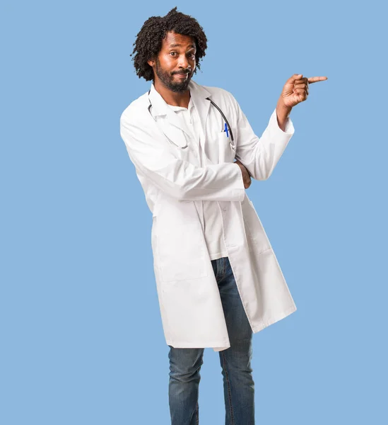 Handsome African American Medical Doctor Pointing Side Smiling Surprised Presenting — Stock Photo, Image