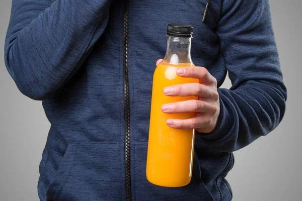 Midsection Young Man Holding Orange Juice Bottle — Stock Photo, Image