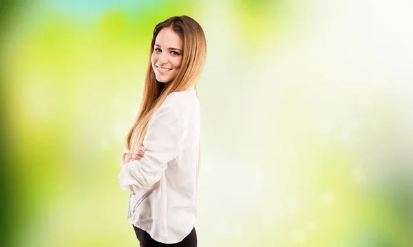 Pretty Young Woman Crossing Arms Blurred Green Background — Stock Photo, Image
