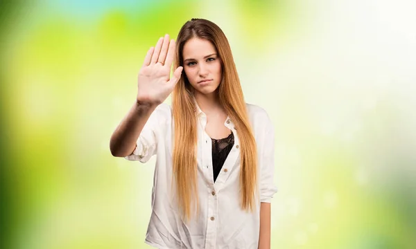 Pretty Young Woman Doing Stop Gesture Blurred Green Background — Stock Photo, Image