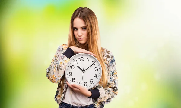 Pretty Young Woman Holding Big Clock Blurred Green Background — Stock Photo, Image