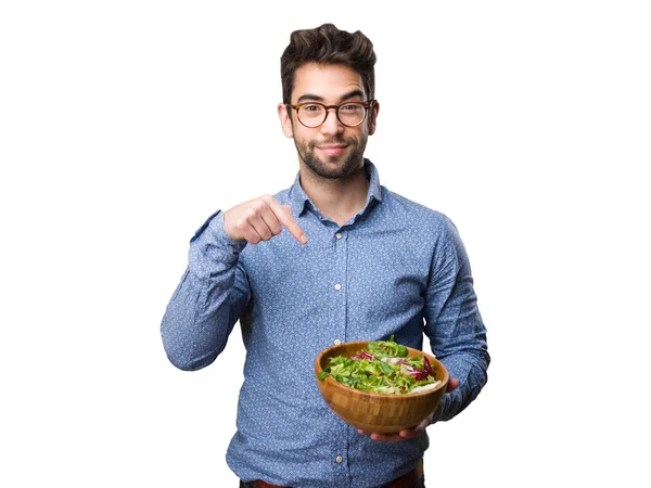 Joven Señalando Ensalada Aislada Sobre Fondo Blanco — Foto de Stock