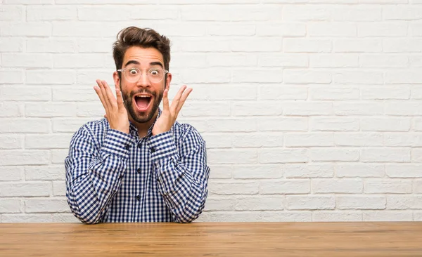 Young Caucasian Man Sitting Surprised Shocked Looking Wide Eyes Excited — Stock Photo, Image