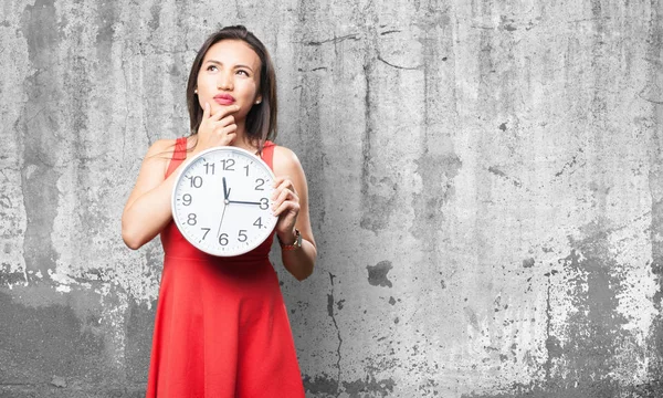Asian Woman Red Dress Holding Clock Grey Grunge Background — Stock Photo, Image