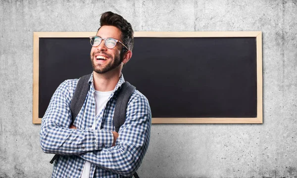 Young Man Laughing Blackboard Wall — Stock Photo, Image