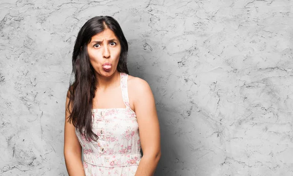 Latin Woman Showing Tongue — Stock Photo, Image