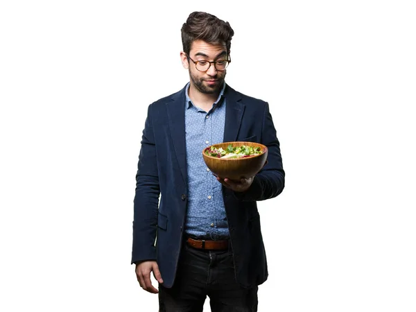 Joven Sosteniendo Una Ensaladera Aislada Sobre Fondo Blanco — Foto de Stock